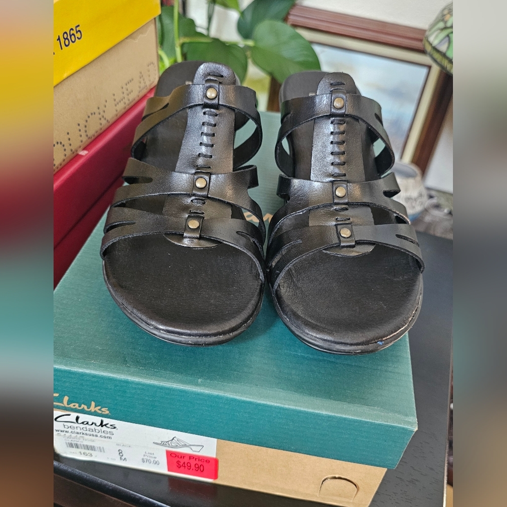 New in box. Clark's black sandals size 8